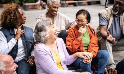 Group of older people socializing and laughing